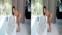 Franceska Jaimes naked by the bathtub looking straight into the 3D TV camera