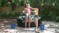 two brunette bikini babes having fun at a carwash in real 3d