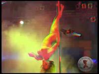 hot poledancer hanging naked upside down in front of the 3d camera