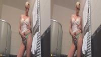 blonde granny with glasses strips in her bathroom in real 3D porn