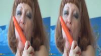 3D TV dildo sucking by old redhead