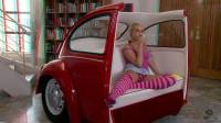 blonde teen blowing bubbles in a car in anaglyph 3d