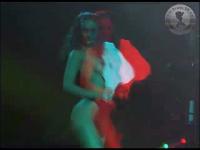 brunette posing topless during erotic fair in Mechelen Belgium in real 3d