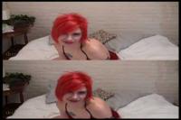 bright redhead with a tattood chest in real 3D
